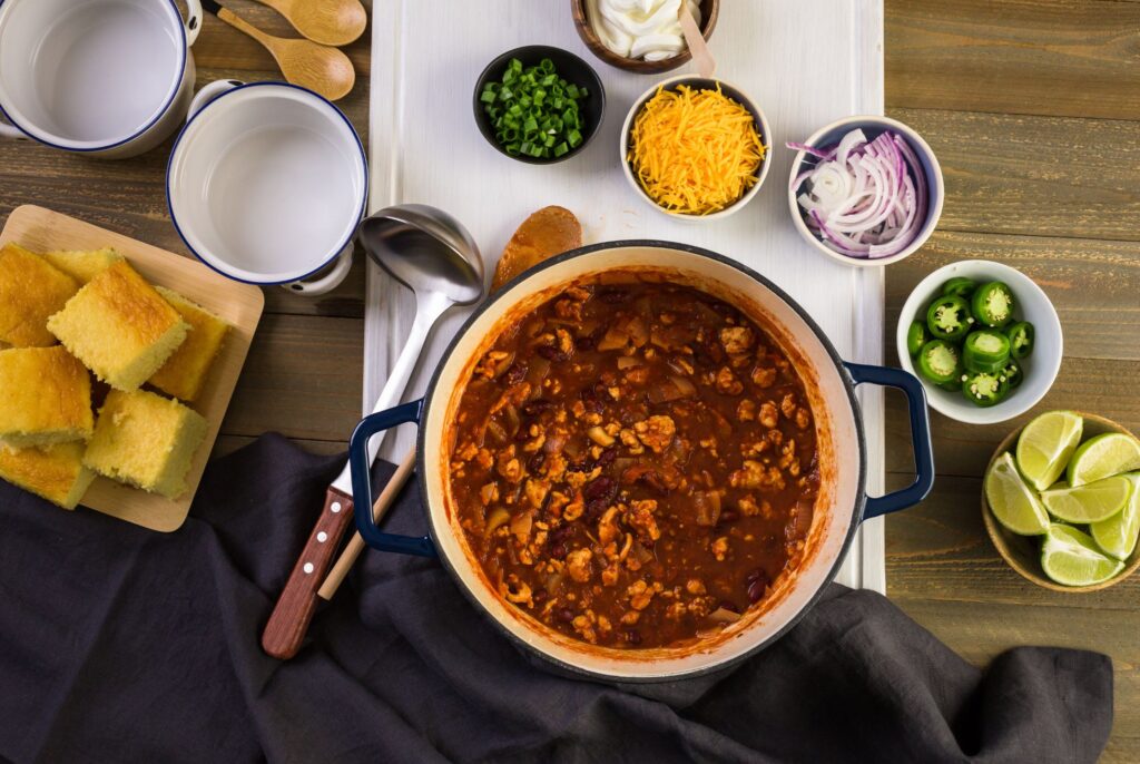 top down view of a batch of chili in a pot