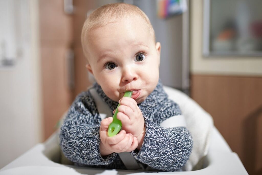 a little baby boy ready to start solids